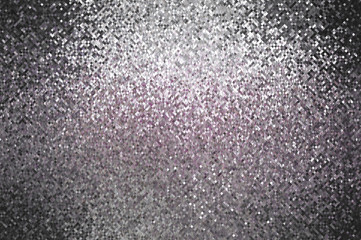 Bokeh light, shimmering blur spot lights on violet abstract back