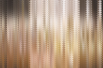 Bokeh light, shimmering blur spot lights on gold abstract backgr