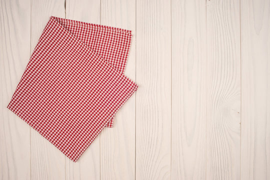 cloth napkin on white wooden background
