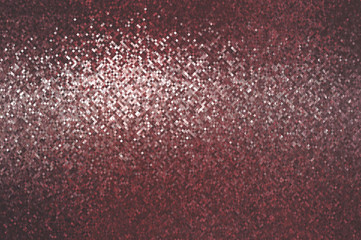 Bokeh light, shimmering blur spot lights on red abstract backgro