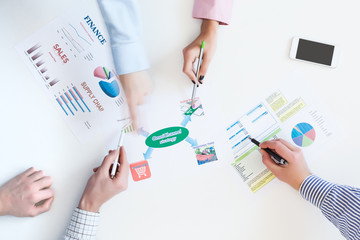 Group of Business People discussing Strategy top View