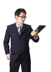 Asian businessman reading important information in file folder,