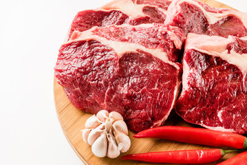 raw beef meat with chili pepper