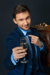 Handsome businessman drinking alcohol 