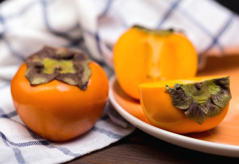 two ripe persimmons