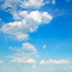 cumulus clouds in the blue sky