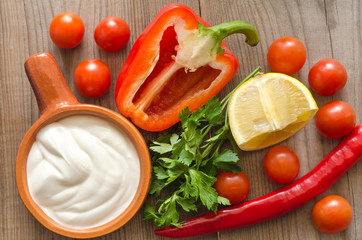 Vegetables and sour cream for cooking