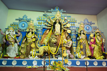 MUMBAI, INDIA - October 20, 2015: An idol of revered goddess Durga standing in the temporary temple...