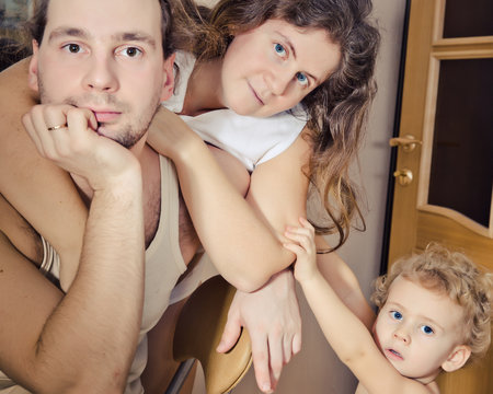 Portrait Of A  Family  In The Home