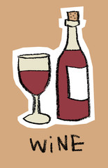 Glass and bottle of red wine on brown background