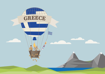 Fototapeta na wymiar Air Balloon with Greek flag and people
