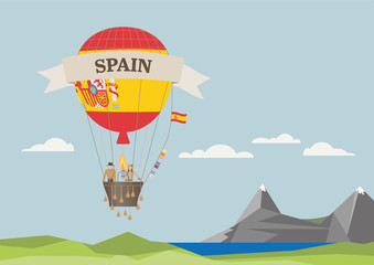 Fototapeta na wymiar Air Balloon with Spanish flag and people