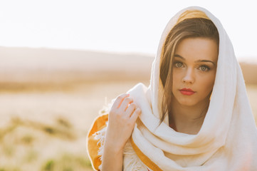 Beautiful bohemian girl in spring garden