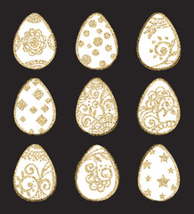 Set of  Easter eggs with gold glitter ornament