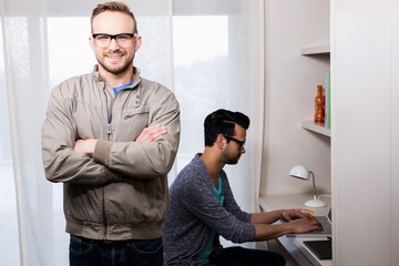 Fototapeta premium Happy gay couple working together