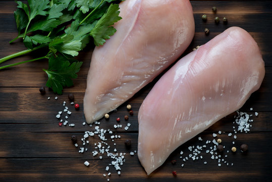 Above view of uncooked fresh chicken breast filets, close-up