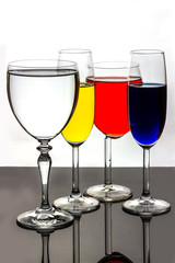 Four stemmed glasses