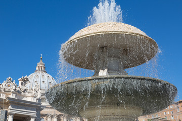 Fountain before St Peters Basilica in Vaticanx