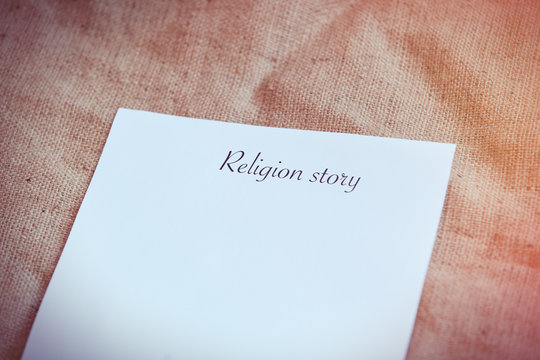 Paper with words Religion story
