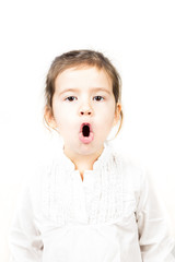 Portrait of little girl with mouth open