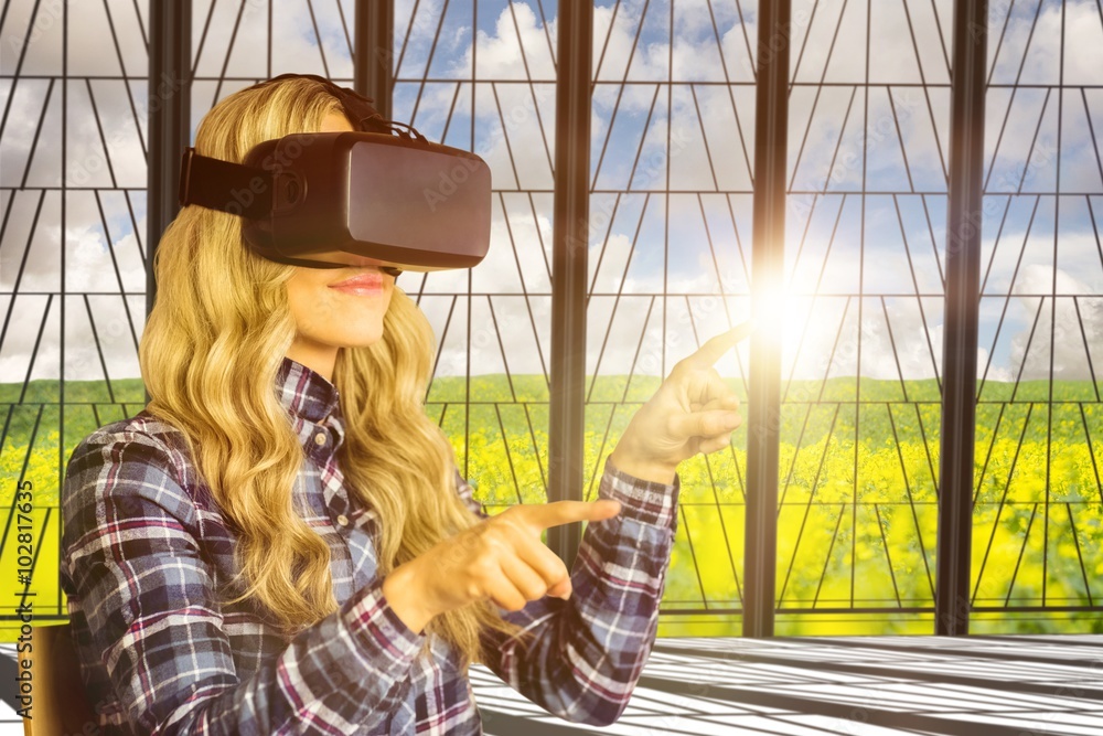 Poster composite image of pretty casual worker using oculus rift
