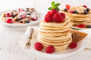 Stack of pancakes with fresh berries