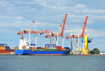 Naklejka premium Cargo crane and ship