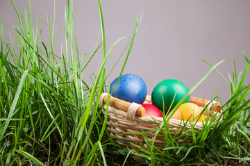 Easter basket with colored eggs