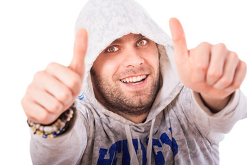 Bearded Guy in Hoody Smiles Slyly Shows Thumbs