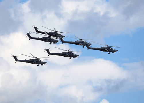 Combat helicopters in flight
