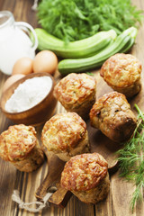 Muffins with zucchini, cheese and herbs