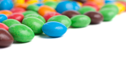 Multicolored candies isolated on white