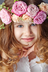 Beautiful little girl with bunch, studio 