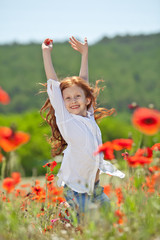 Beautiful kid in a red flowers field  © nuzza11