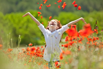 Beautiful kid in a red flowers field  © nuzza11