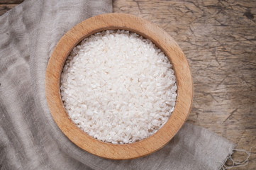 Fototapeta na wymiar Rice in wooden bowl
