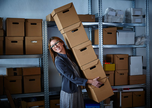 Funny Businesswoman Holding Storage Boxes