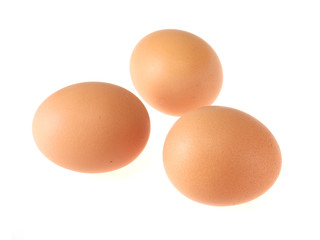 three eggs isolated on white background