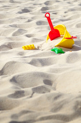 Fototapeta na wymiar Toys on the sand