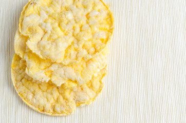 corn cake, puffed corn on table, breakfast background.