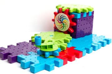 Fototapeta na wymiar Plastic toy blocks on white background