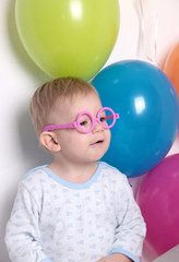 Fototapeta na wymiar baby with balloons