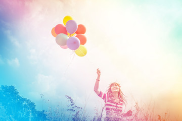 Woman with colorful Balloons in the Park,Outdoors lifestyle filters images