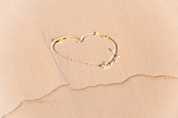 Heart in the sand of a beach