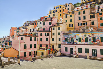 Fototapeta na wymiar Buildings architecture in Cinque Terre region, Riomaggiore village, one of the most attractive region in Italy and world.