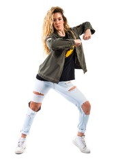 Teenager blonde girl dancing