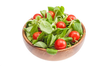 Red tomatoes in a plastick pack. Isolated, white background,