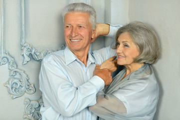 elderly couple in vintage interior