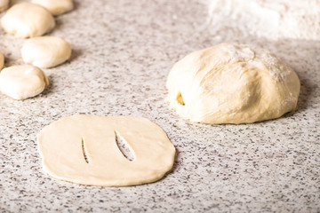 Housewife cooking dough