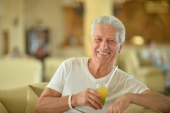 Senior Man Drinking Cocktail